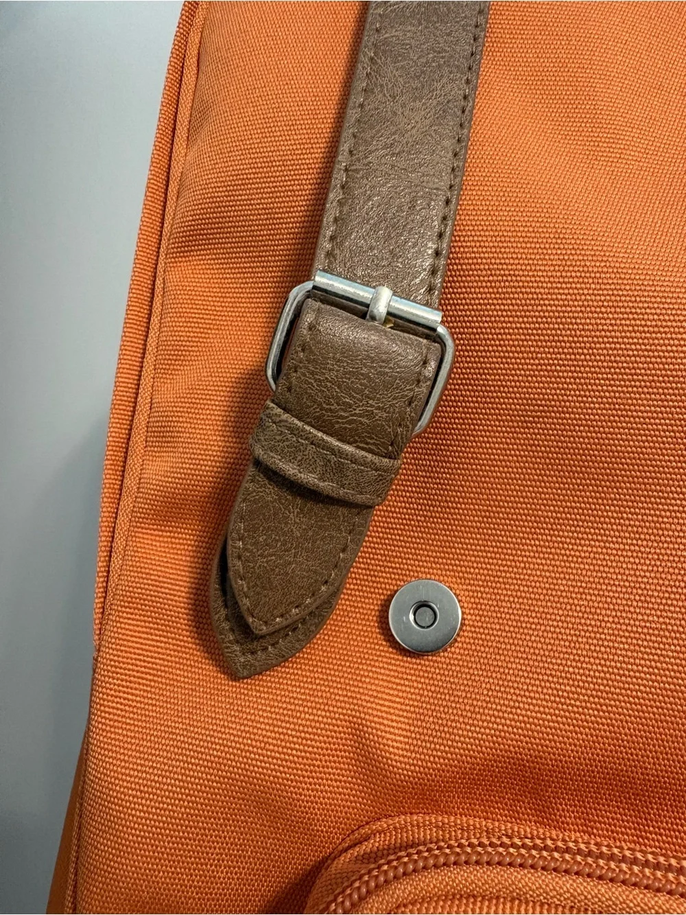 Orange Canvas Backpack with Brown Accents